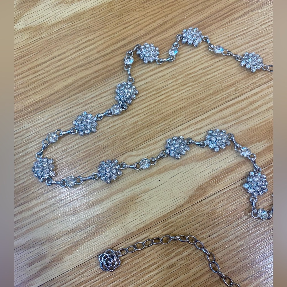 Rhinestone camellia flowers “chain” belt. Silver. Size Small GUC